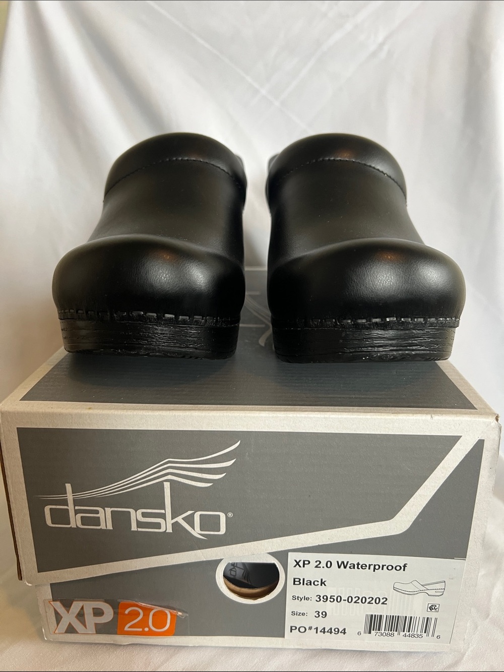 Dansko Black Leather Slip-On Clogs Used Like New. Worn Once Excellent Condition